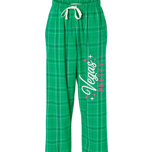 Women’s green plaid lounge pants featuring Vegas Pretty design in pink and white, perfect for travel, lounging, and conference wear